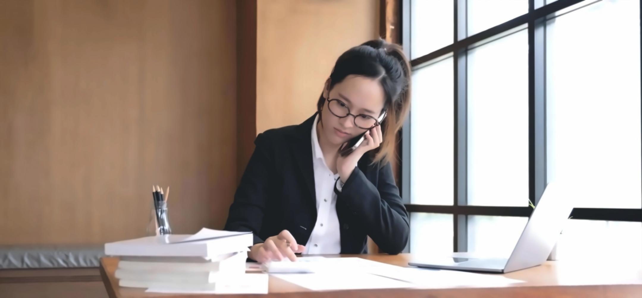 Entrepreneur reviewing business documents and feedback forms in a modern office setting